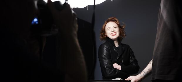 Woman, Sarah Gordy, posing for camera at Rankin photo shoot 