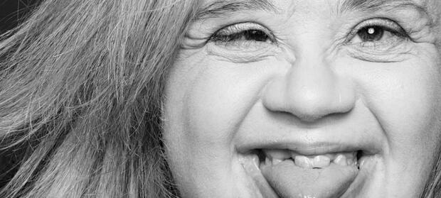 Woman smiling with her tongue out