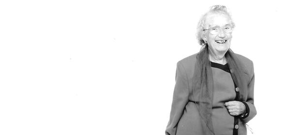 Elderly lady smiling at camera