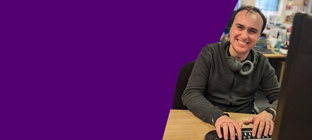 A man sitting at a computer
