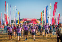 Participants walking towards start sign