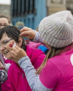 Picture of a woman, Lorraine, having her face painted