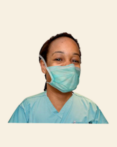 A nurse with a face mask on