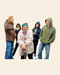 A woman being bullied by a group of four young men wearing hoodies.