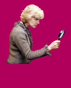 A woman looking closely at something using a magnifying glass