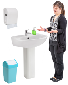A woman standing at a bathroom sink